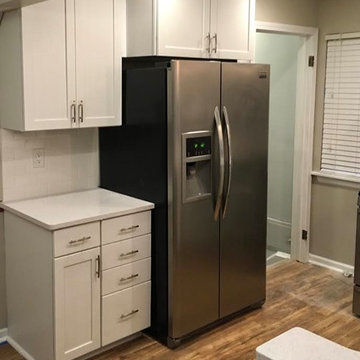 Kitchen Cabinets Refinished from Maple to White