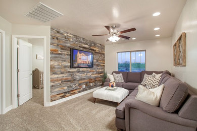 Family room - mid-sized contemporary open concept carpeted and beige floor family room idea in Phoenix with no fireplace, a wall-mounted tv and beige walls
