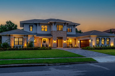 Example of a farmhouse exterior home design in Orlando