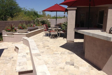 Mid-sized tuscan backyard tile patio kitchen photo in Phoenix with a pergola