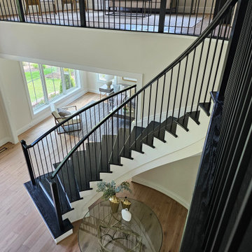 Project #130 | Curved Staircase with Wraparound Balcony