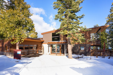 Rustic exterior home idea in Other