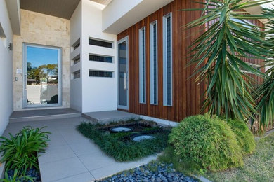 This is an example of a large contemporary exterior in Gold Coast - Tweed.
