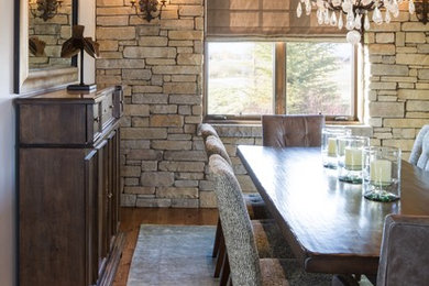 Example of a mid-sized trendy carpeted enclosed dining room design in Other with white walls and no fireplace