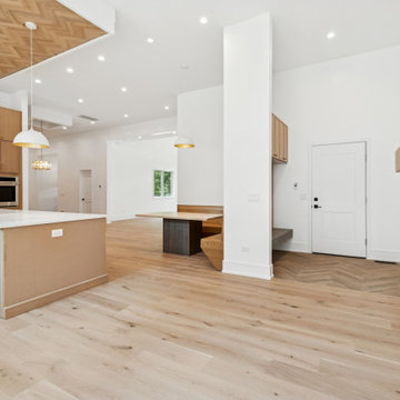 Light-Washed Great Room with Signature Fireplace & Slatted Wood Ceiling