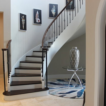 Curved Red Oak Stair with Single Basket & Twist Iron Balusters