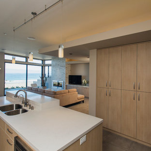 Modern kitchen pantry inspiration - Minimalist kitchen pantry photo in San Luis Obispo with an undermount sink, flat-panel cabinets, light wood cabinets and an island