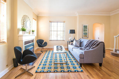 Transitional living room photo in Denver