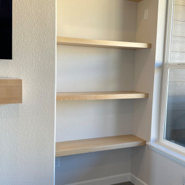 Custom built-in plus floating shelves