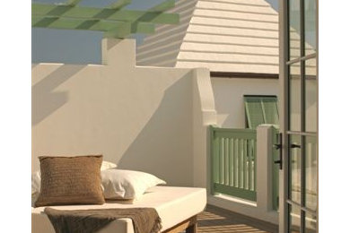 Inspiration for a tropical exterior home remodel in Birmingham