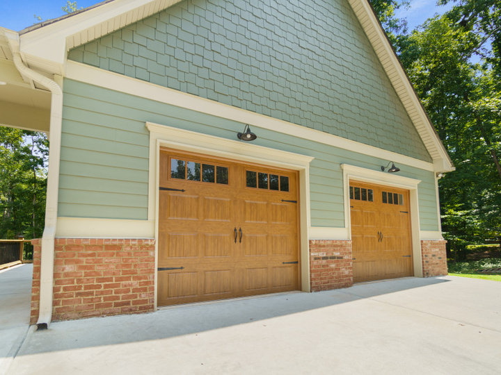An illustration of a sizable detached two-car farmhouse garage