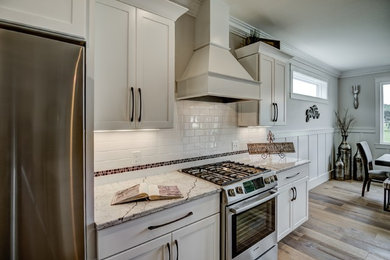 Example of a transitional kitchen design in Other