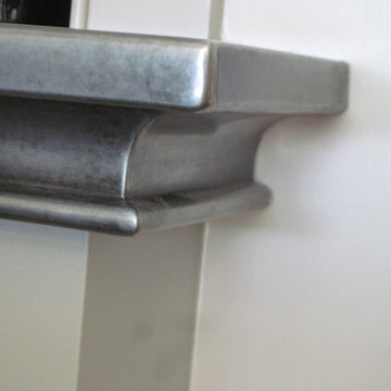 mitered zinc curved counter self edge w/ bead
