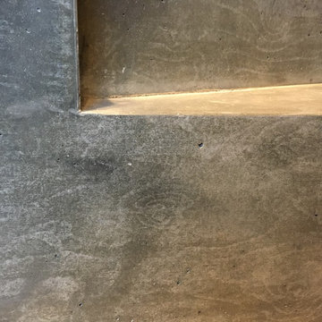 Gainsborough Studios concrete worktop with cast in-situ sink & stair podium