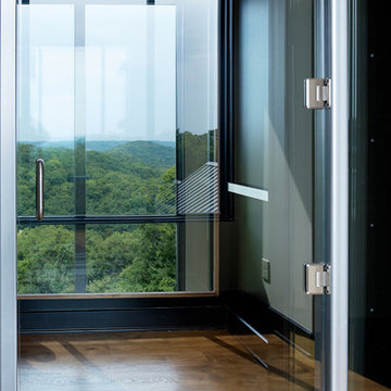 Custom Glass Elevator with power sliding glass doors
