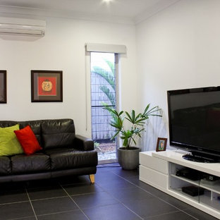 Inspiration for a mid-sized beach style enclosed home theater remodel in Cairns