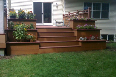 Small elegant patio container garden photo in Minneapolis with decking and no cover