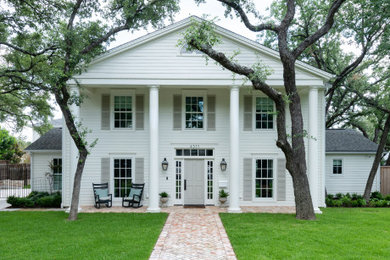 Large elegant white two-story concrete fiberboard and clapboard exterior home photo in Austin with a shingle roof and a gray roof