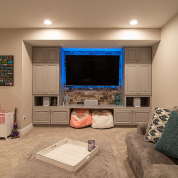 Basement With Entertainment Area for Family With Traditional Style Kitchenette