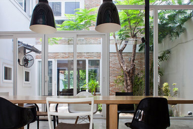 Inspiration for a contemporary dining room remodel in Other