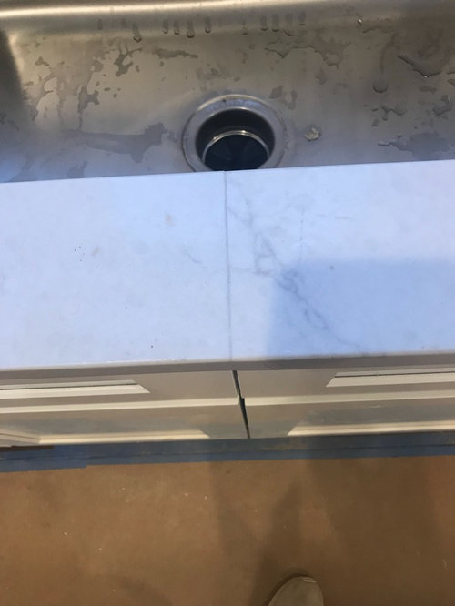 noticeable seam in quartz counters..can we do anything to fix it?