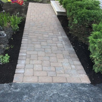 Stoops and sidewalk with pavers