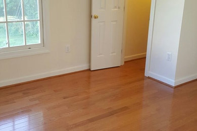 Bedroom - orange floor bedroom idea in DC Metro