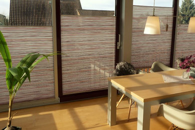 This is an example of a contemporary sunroom in Frankfurt.
