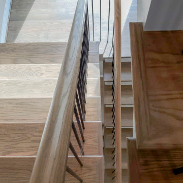 Project #153 | Sophisticated Red Oak Stair with Metal Balusters