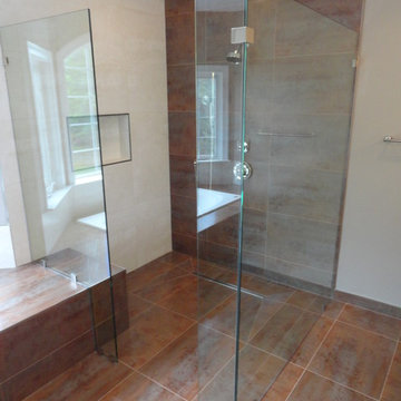 Custom Glass Spray Panels, Splash Guards, and Fixed Panel Shower Units