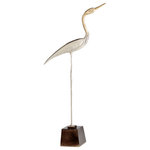 Cyan Design - Shorebird Sculpture #2 - Play up a mantel with this sophisticated nickel bird sculpture. Metallic color blocking creates neutral decor with a refined twist. The metal figure features thin and elongated lines, adding contrast and effortless class.