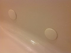 Can whirlpool tub be converted to regular tub? - ... glued them over the jets. I have had this solution in place for 5  years. No issues. (The glue has yellowed a bit over time, but, no biggie!)