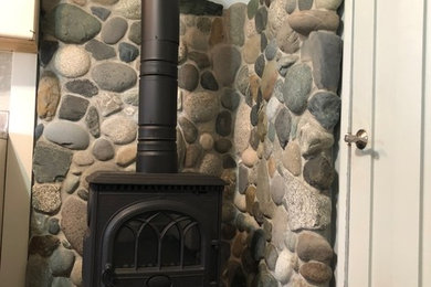 wood stove rock wall
