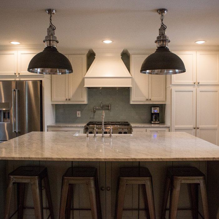 Full kitchen remodel in the Dallas - Lakewood Heights 75214 zip code, including custom paint-grade wood cabinetry, 3CM quartz countertops, gray porcelain subway tile backsplash, Kitchen Aid stainless