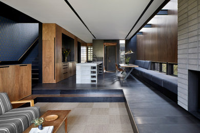 Design ideas for a large modern open plan dining in Melbourne with brown walls, grey floor, recessed and wood walls.