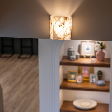 Traditional Basement Remodel with Custom Bar & Entertainment Spaces