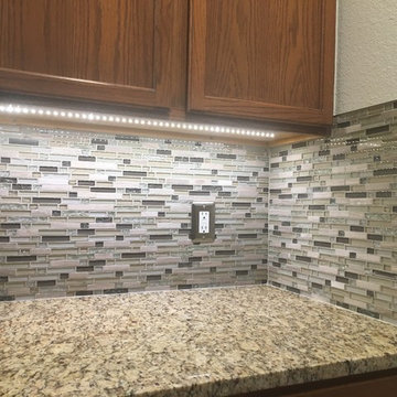 Kitchen Backsplash - Linear Mosaic and Glass with Santa Cecilia Granite Counter