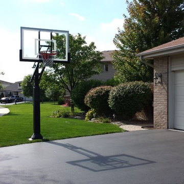 Tom Z's Pro Dunk Silver Basketball System on a 35x18 in Orland Hills, IL