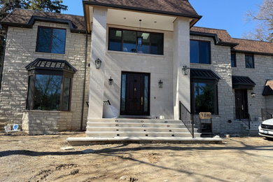 Example of a trendy exterior home design in Toronto