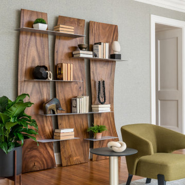 Warm Contemporary Living Room with Unique Bookshelf