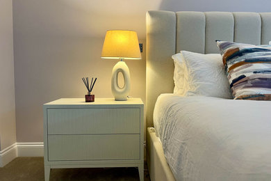 Design ideas for a modern bedroom in London.