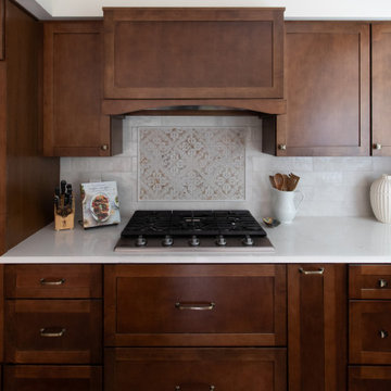 From Stark to Stylish: A Warm Kitchen Remodel with Evergreen Charm