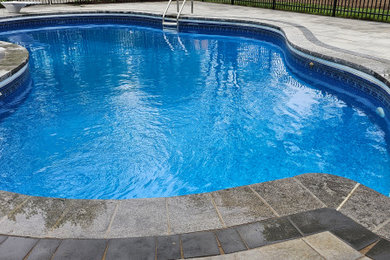 Inspiration for a transitional pool remodel in Toronto