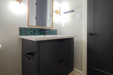 Powder room - modern powder room idea in Austin