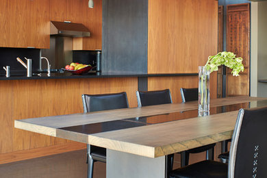 Mid-sized trendy concrete floor kitchen/dining room combo photo in Seattle with beige walls
