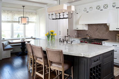 Elegant galley eat-in kitchen photo in DC Metro with recessed-panel cabinets, white cabinets, brown backsplash and limestone backsplash