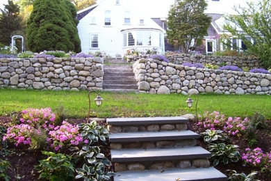 Round Fieldstone Wall with steps to create a very New England look