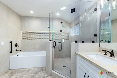 Example of a large transitional master beige tile and ceramic tile ceramic tile, gray floor, double-sink and wainscoting bathroom design in San Diego with shaker cabinets, white cabinets, a bidet, an undermount sink, quartz countertops, beige countertops, a niche and a built-in vanity