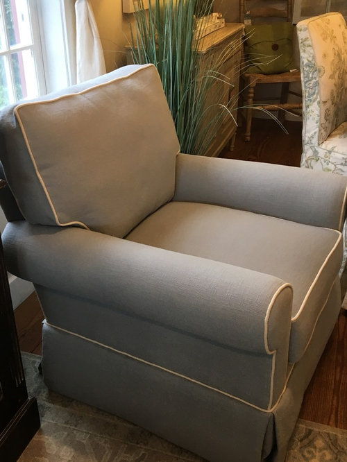 Which style upholstered chairs to go with leather sofa we're buying?