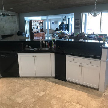 Resurfaced kichen with white, textured doors